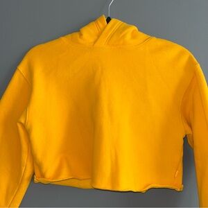 Raw Hem Yellow TNA Cropped Hoodie